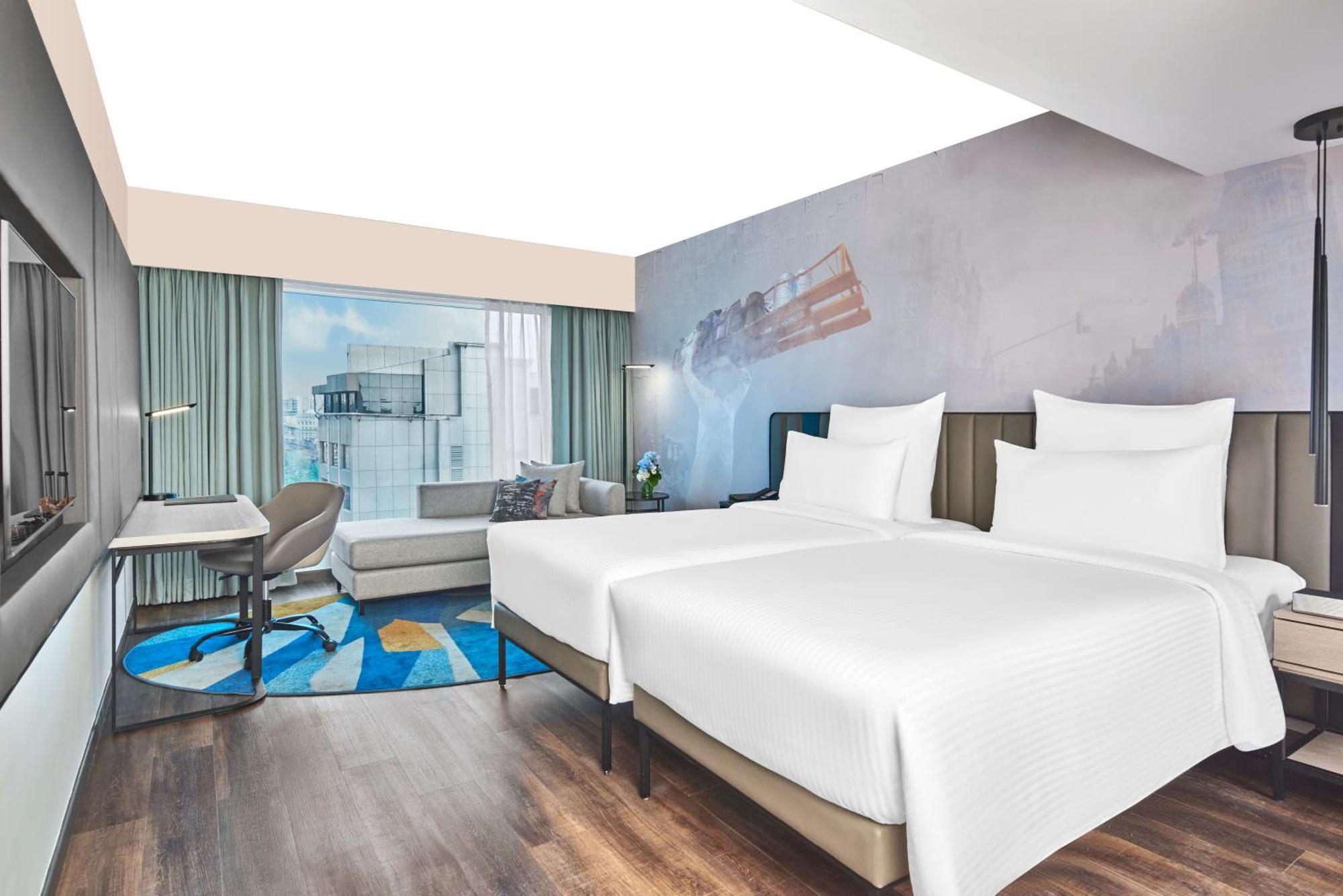 Novotel Mumbai International Airport Bagian luar foto Deluxe Room