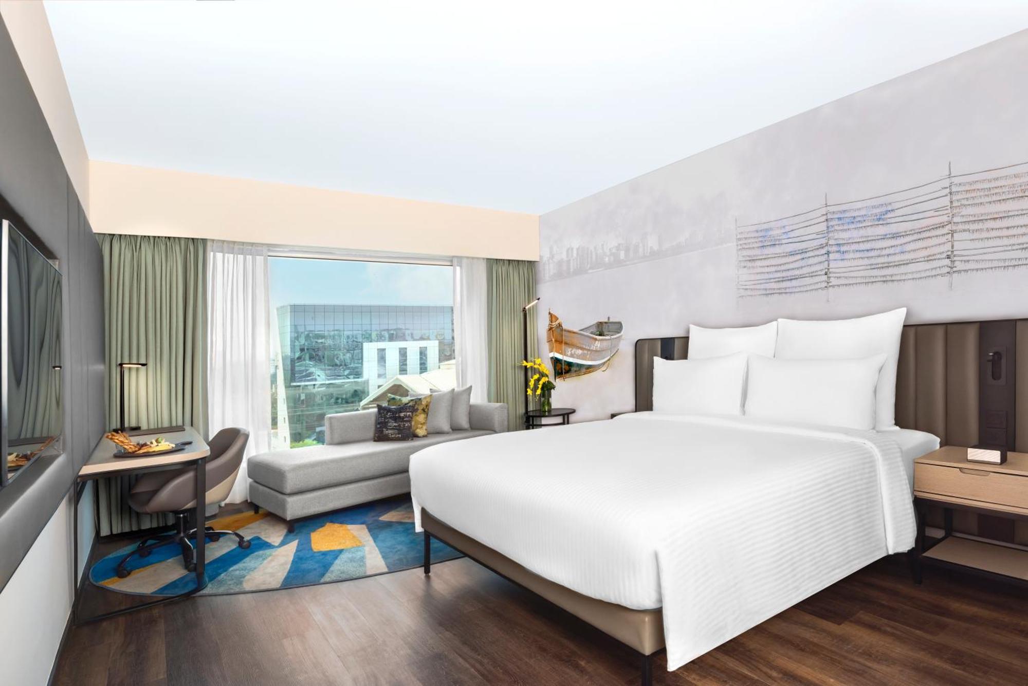 Novotel Mumbai International Airport Bagian luar foto Deluxe Room